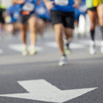 group of runners on road
