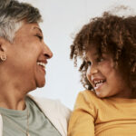 woman and child together smiling