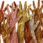 Cracked hands being held up