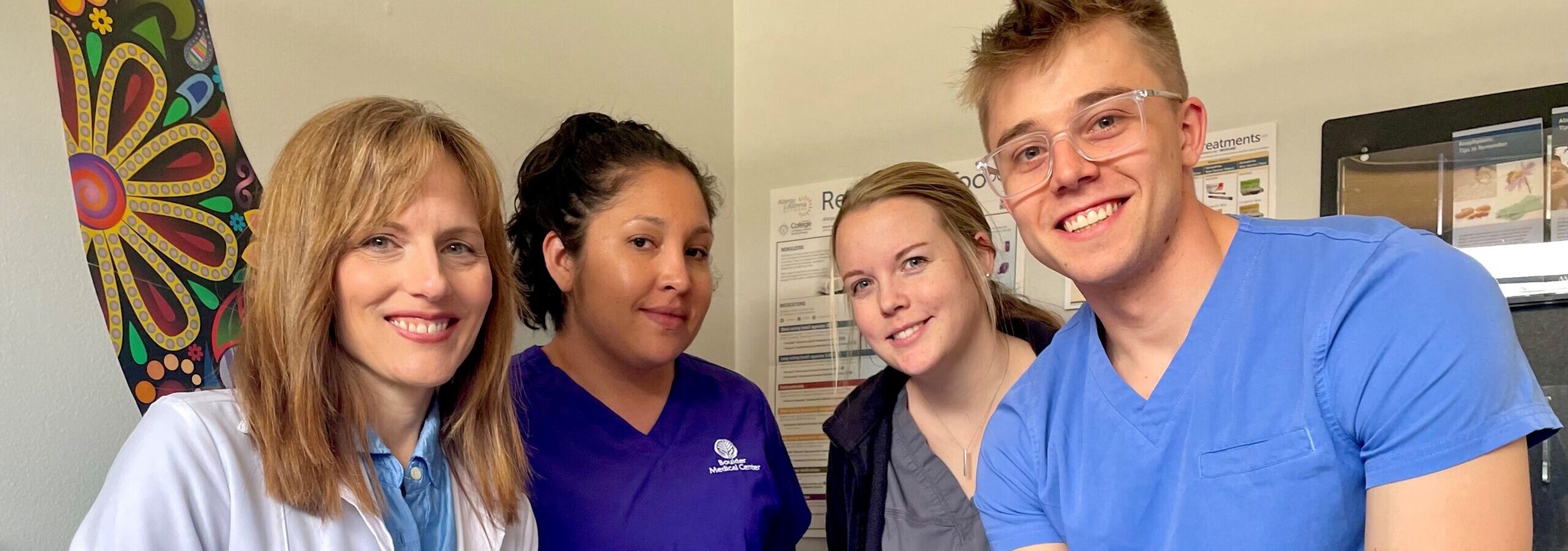 Dr Andrews and team of three staff