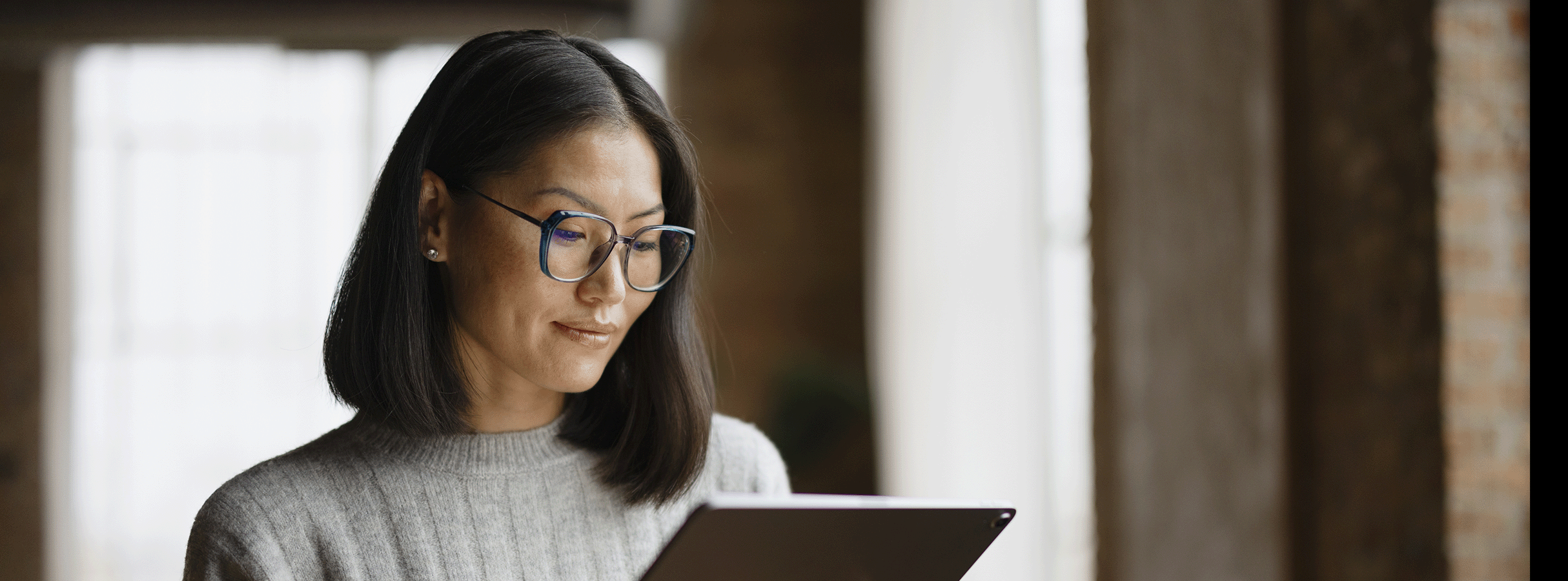 Woman looking at ipad